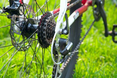 Rear racing bike cassette on the wheel with chain clipart