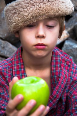 The boy and green apple clipart