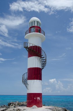 Punta Cancun lighthouse at the middle of noon heat