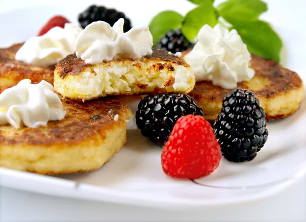 stock image Curd pancakes with berries .