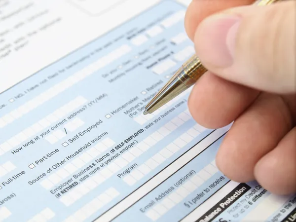Filling out application form. — Stock Photo, Image