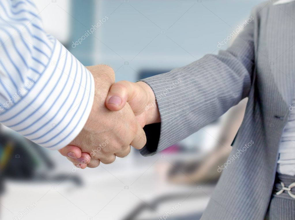 Business shaking hands.