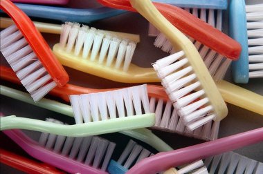 Set of multicolor toothbrushes clipart