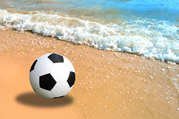 Football in the sand at the beach — Stock Photo, Image