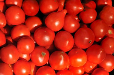 Fresh tomatoes on street market for sale clipart