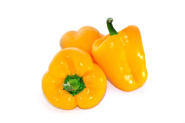 Three fresh yellow sweet pepper isolated on white background — Stock Photo, Image