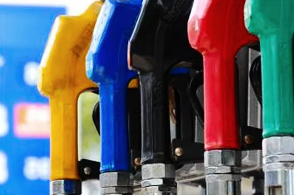 Different types of fuel dispensers at filling station — Stock Photo, Image