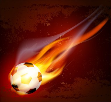 Vector flying flaming soccer ball on a brown background clipart