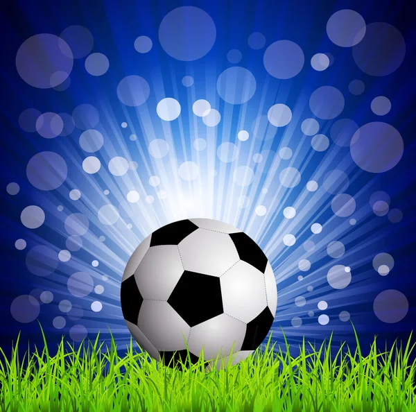 Football vectoriel sur gazon, sur fond bleu avec des rayons — Image vectorielle