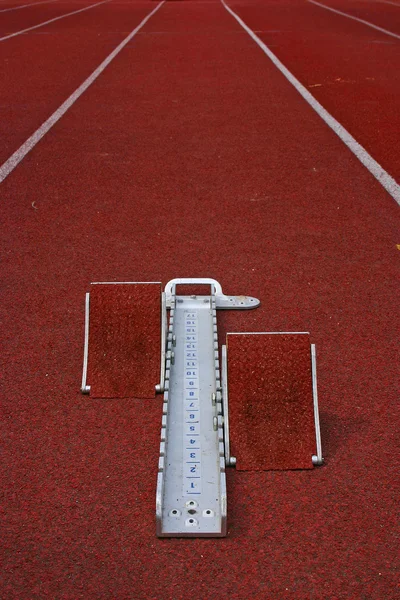 Startgroparna atletisk och löparbana — Stockfoto