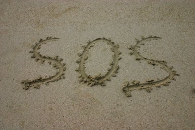 SOS written in sand clipart