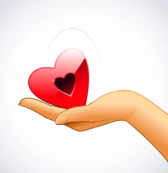 Рука жінки тримає червоне серце — стоковий вектор