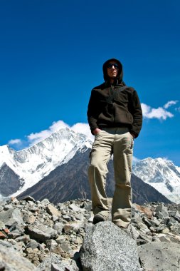 A man in high mountains, Sichuan, China clipart