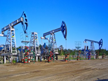 Oil pumps in Surgut, Russia. Oil industry equipment clipart