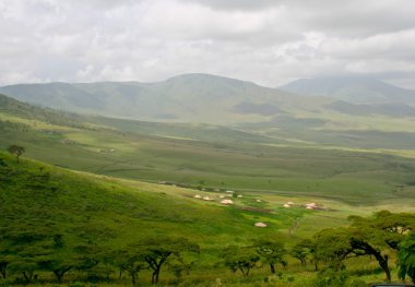 Maasai village on a hill in Tanzania, Africa. clipart