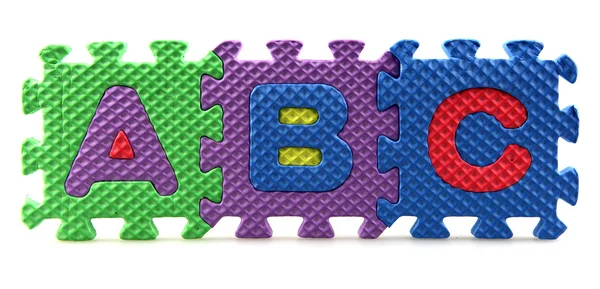 Peças de quebra-cabeça alfabeto — Fotografia de Stock