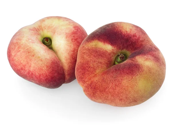 Två kinesiska platta persikor — Stockfoto