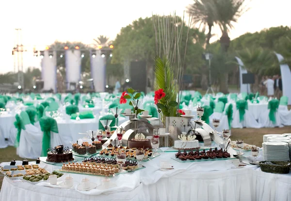 Covered table for a buffet table at the festival — Stock Photo, Image