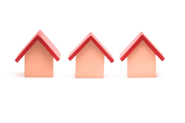 Kis piros tetős modell ház felett fehér — Stock Fotó