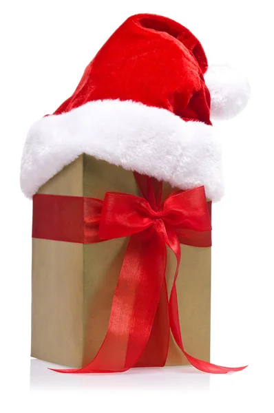 Geschenk mit Schleife und Gummibeutelmütze verziert — Stockfoto
