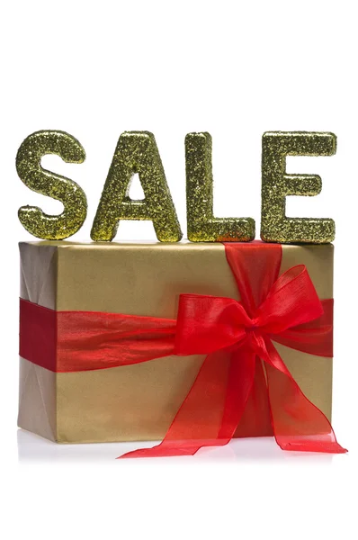 stock image Present decorated with the word sale