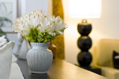 Flower vase in beautiful interior design clipart