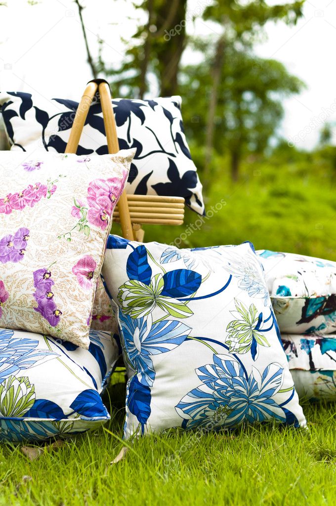 Beautiful pillow displayed on lawn in a garden