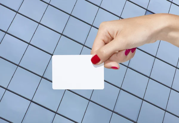 Hand holding an empty business card — Stock Photo, Image