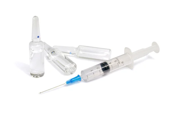 Single use syringe and vaccine — Stock Photo, Image