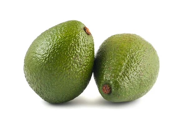 Два спелых зелёных авокадо — стоковое фото