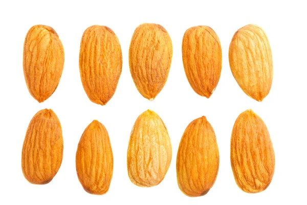 Mandlové ořechy na bílém pozadí — Stock fotografie