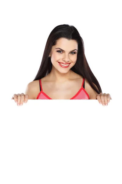 Mladá, krásná brunetka drží transparent — Stock fotografie