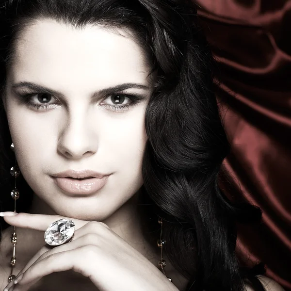 Stock image A beautiful young woman is in red clothes