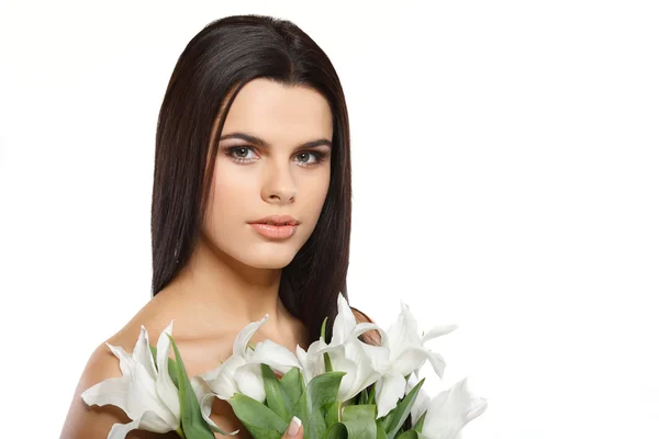 Vacker ung flicka med tulpaner — Stockfoto