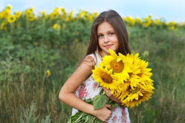 A little girl is in the field clipart