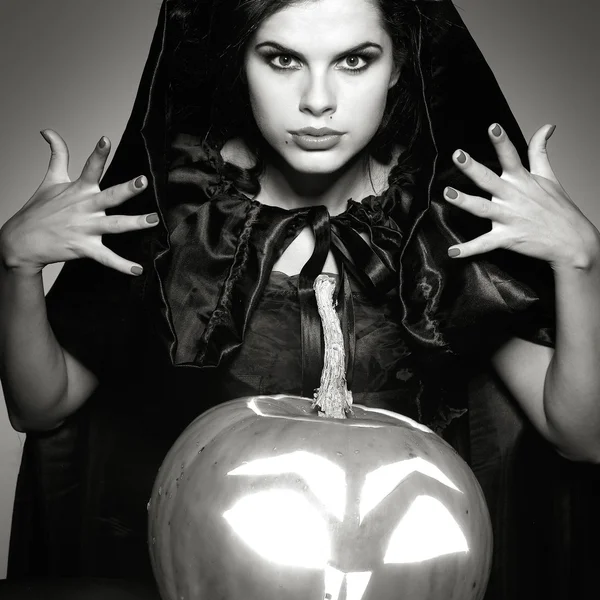 Sexual brunette in the suit of witch in night of Halloween — Stock Photo, Image