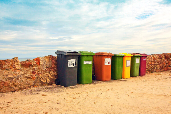 Collection of bins at the beach