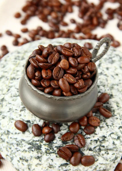 Fresh aromatic coffee beans in a metal coffee pot — Stock Photo, Image
