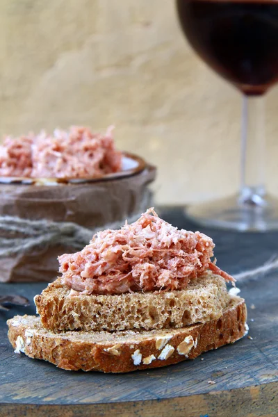 Pate of duck meat Rillettes de Canard with a glass of wine — Stock Photo, Image