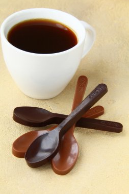 Chocolate spoons black and milk chocolate stylish candy clipart