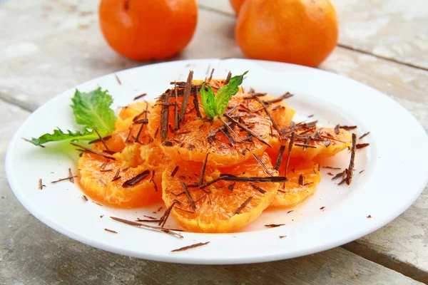 Ensalada de frutas con mandarina naranjas y chocolate —  Fotos de Stock