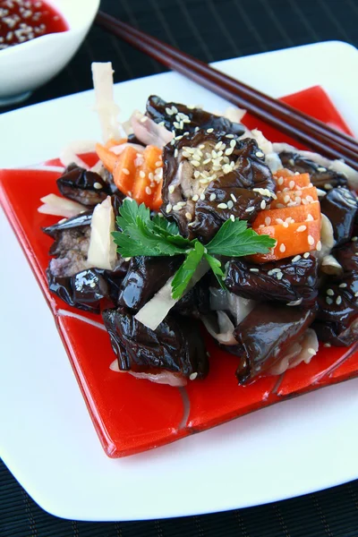 Asian vegetable eggplant salad on a traditional dish — Stock Photo, Image