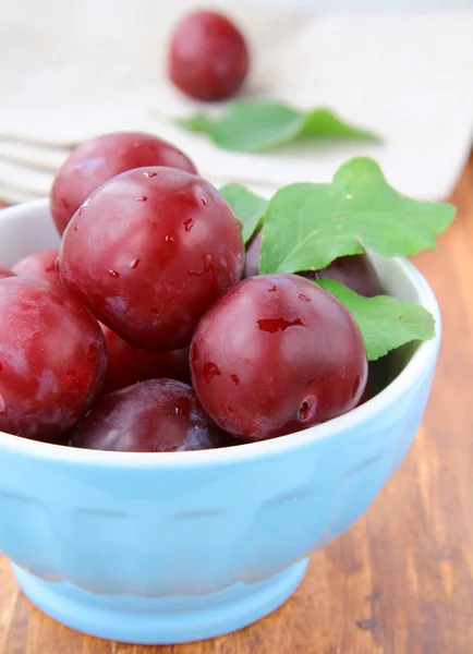 stock image Ripe, fresh red plums on the table