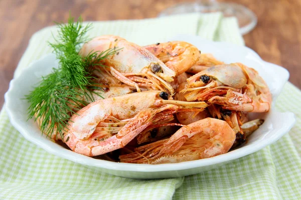 Grilled shrimp with spices and dill on a plate — Stock Photo, Image