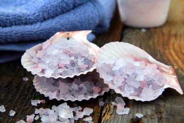 Spa still life .Bath lilac salt, towel and candle clipart