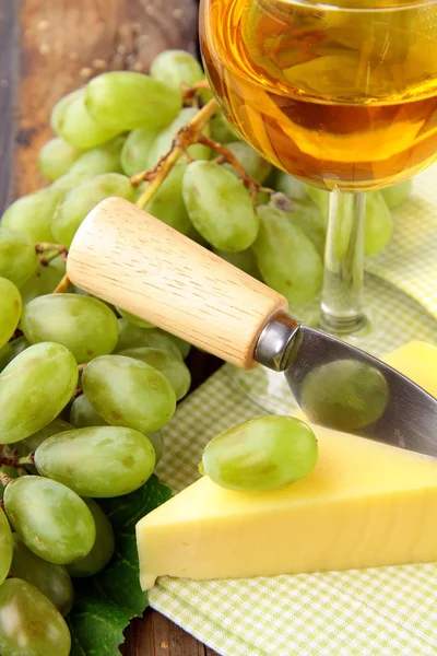 Still-life with grapes white wine and piece of cheese — Stock Photo, Image