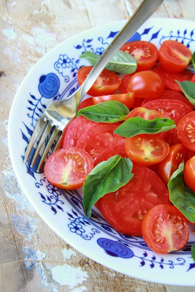 stock image Salad of fresh tomatoes with basil