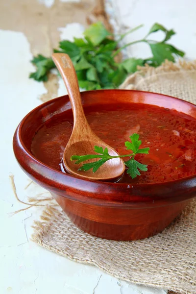 stock image Traditional Russian ukrainian borscht soup at a wooden table