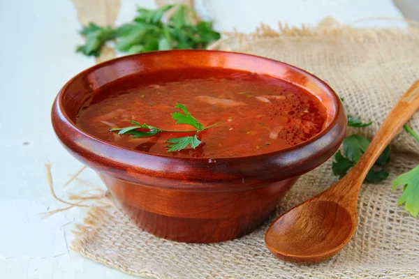 Traditional Russian ukrainian borscht soup at a wooden table — Stock Photo, Image