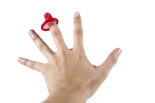 Condom in hand — Stock Photo, Image